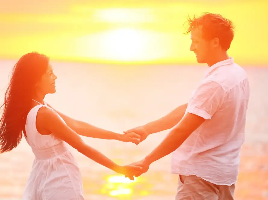 couple posing with sunset